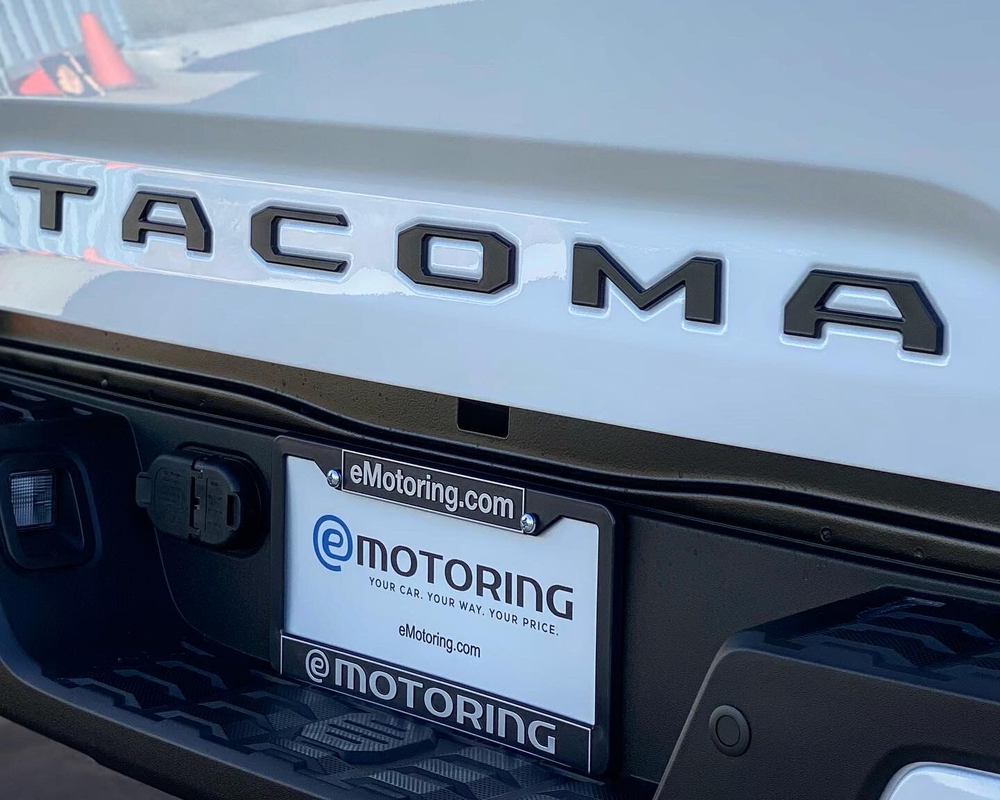 A Porsche 911 Targa 4 GTS with an eMotoring plate frame